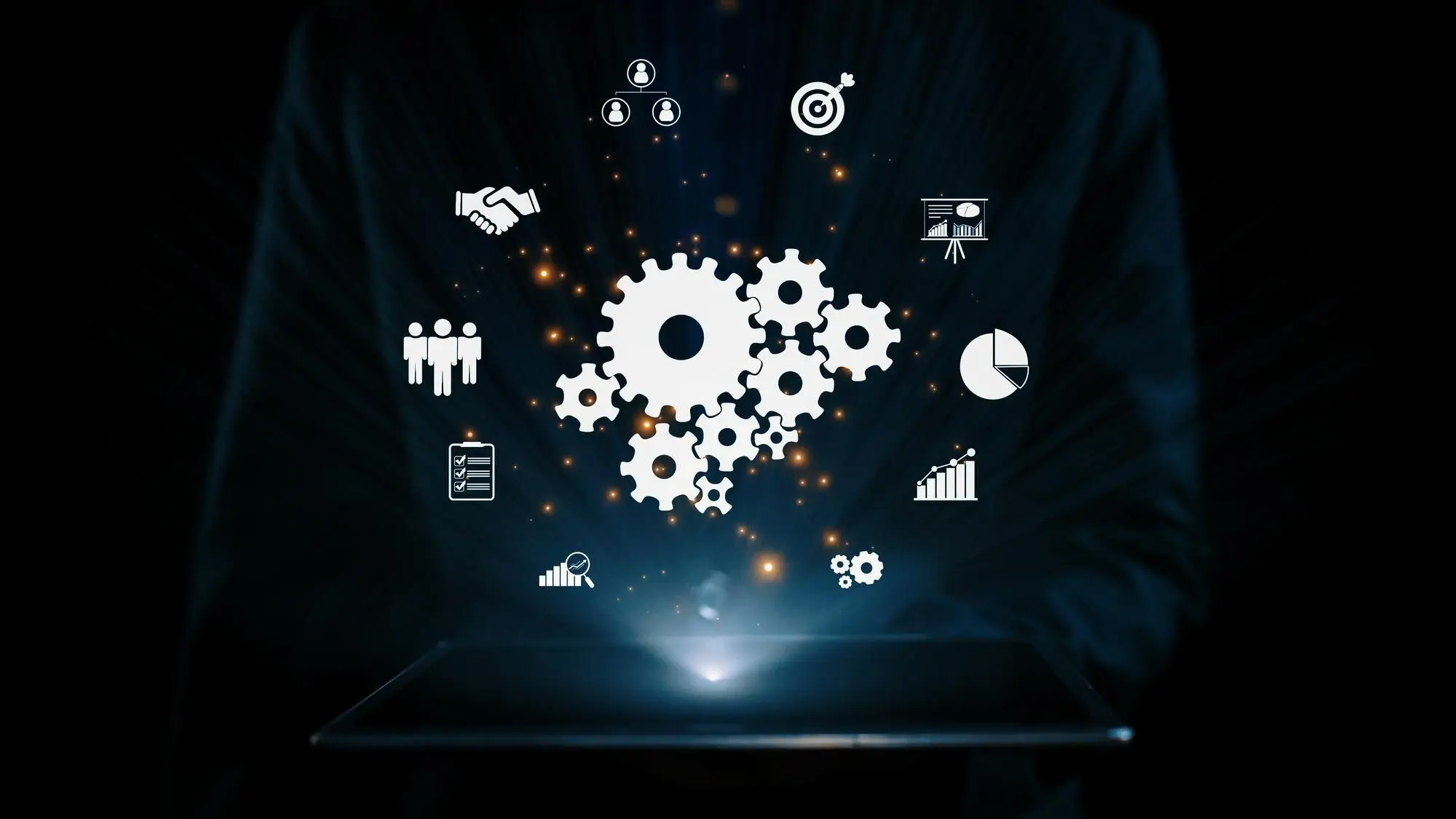 Custom business solution with gears and icons showing workflow automation, 				analytics, and team collaboration for SMEs